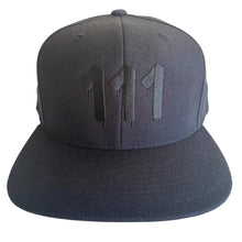 Load image into Gallery viewer, Black hat featuring black embroidered 111 Angel Number from Angel Numbers Merch Official. Symbolizes new beginnings & alignment.