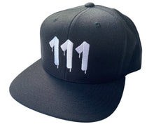 Load image into Gallery viewer, Black hat featuring white embroidered 111 Angel Number from Angel Numbers Merch Official. Symbolizes new beginnings & alignment