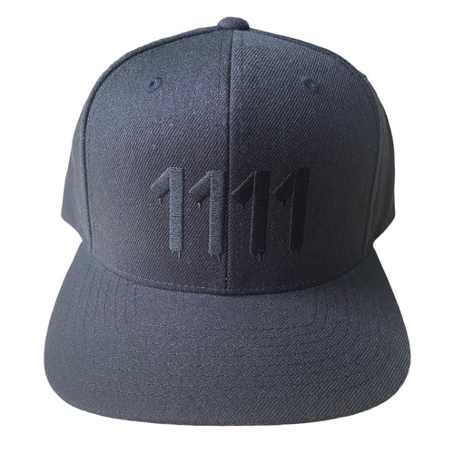 1111 Angel Number Hat  Black/Black embroidery from Angel Numbers Merch Official, representing synchronicity & manifestation.


