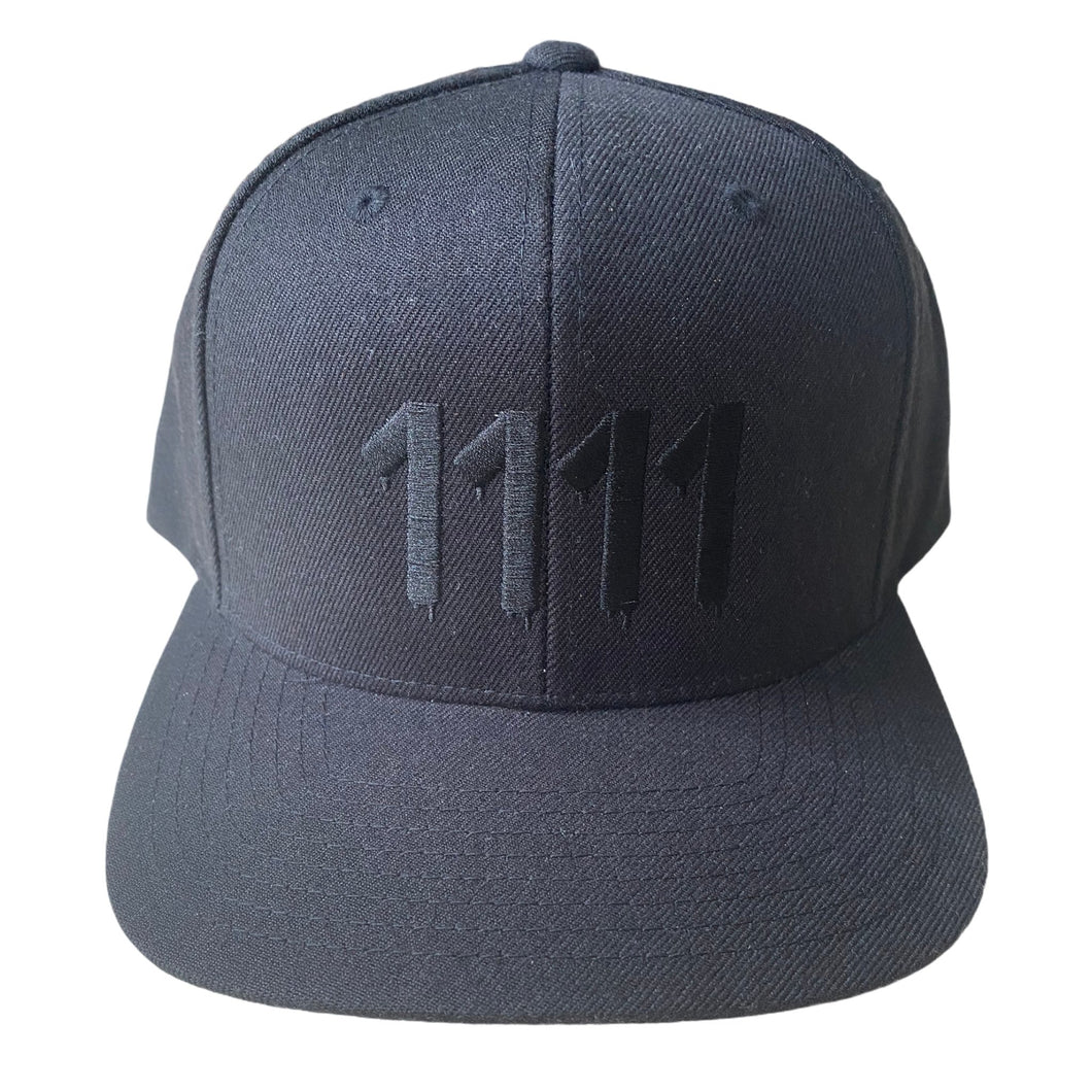 1111 Angel Number Hat  Black/Black embroidery from Angel Numbers Merch Official, representing synchronicity & manifestation.

