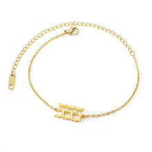 Load image into Gallery viewer,  Gold 555 Angel Number Ankle Bracelet from Angel Numbers Merch Official, representing transformation, courage, and embracing change.
